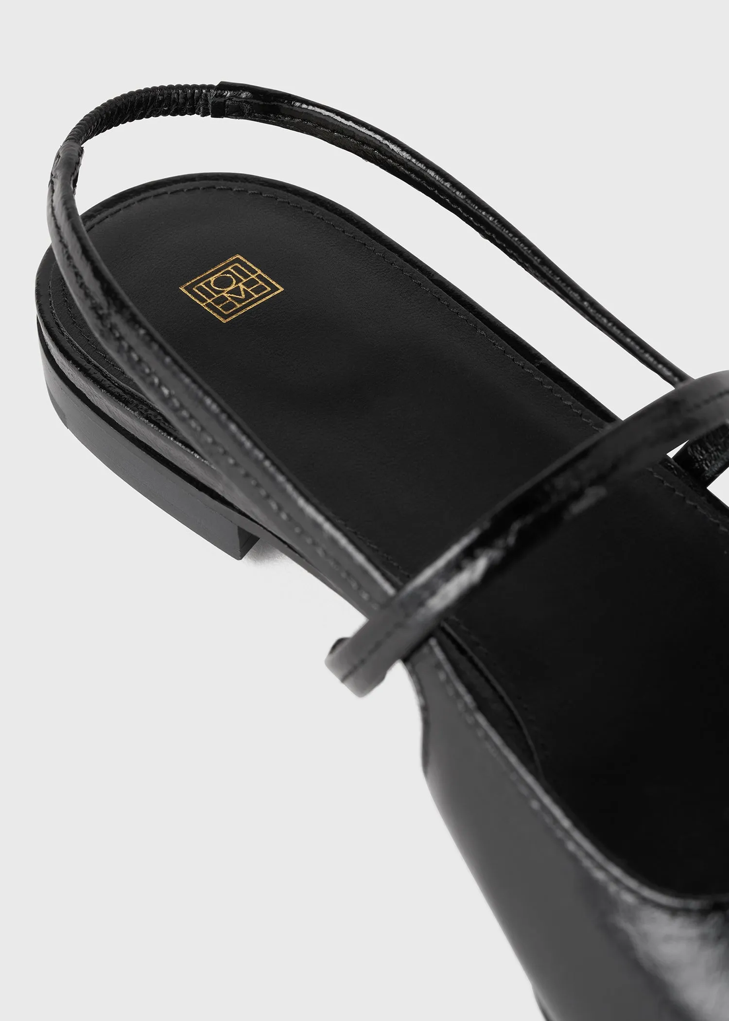 The Sharp Slingback Flat black